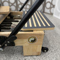 Load image into Gallery viewer, Nano Pro Studio Quality Home Reformer PersonalHour Colors - Wheels and Foot Bar Close Up
